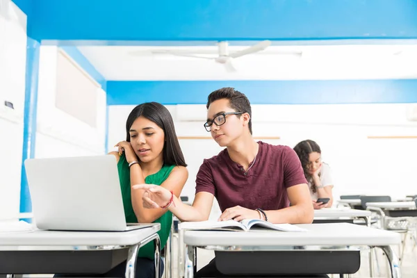 Teenage Boy Assisting Classmate Using Laptop Class — Stock Photo, Image