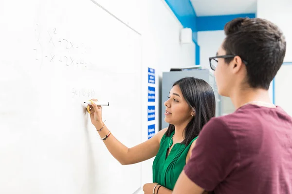 Teenage Girl Solving Equation Whiteboard While Standing Classmate School — Stock Photo, Image