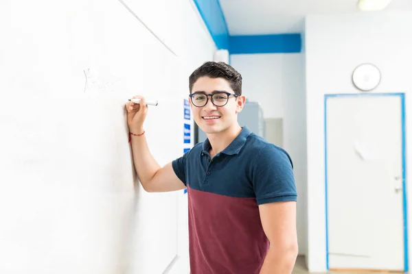 Portrait Smiling Teenage Boy Solving Equation Whiteboard School — Stock Photo, Image