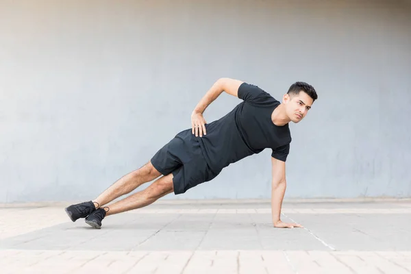 Full Length Determined Young Athlete Doing Side Plank Exercise Sidewalk — Stock Photo, Image