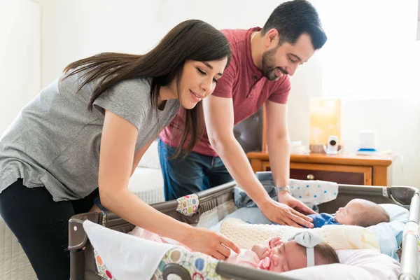 Mother Father Admiring Babies Together Home — Stock Photo, Image
