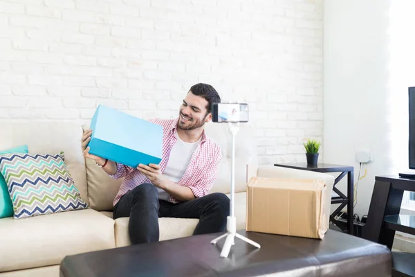 Smiling Male Influencer Showing Product Online Followers Smartphone — Stock Photo, Image