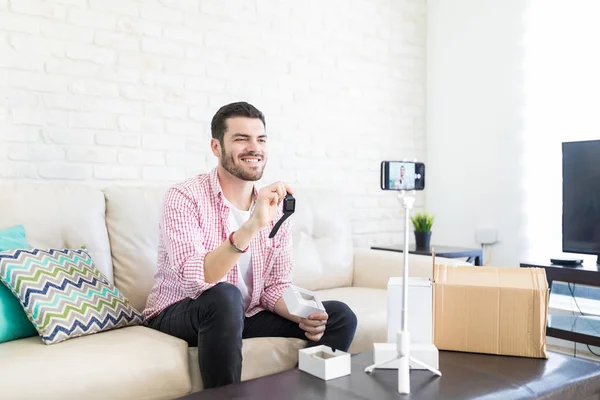 Hispanic Guy Sharing Smartwatch Unboxing Video Viewers Home — Stock Photo, Image