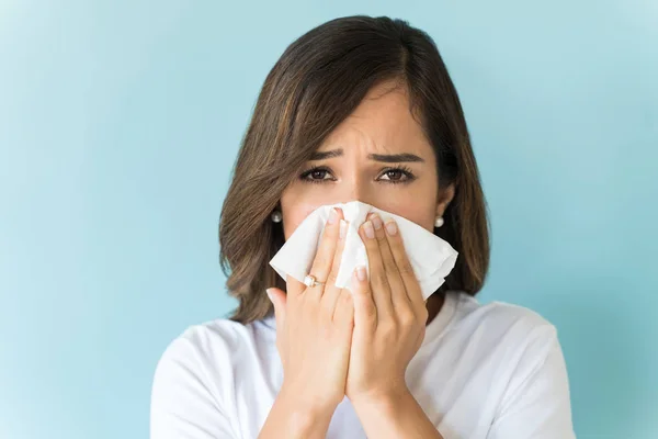 Closeup Unwell Mid Adult Female Wiping Nose Tissue Studio — Stock Photo, Image