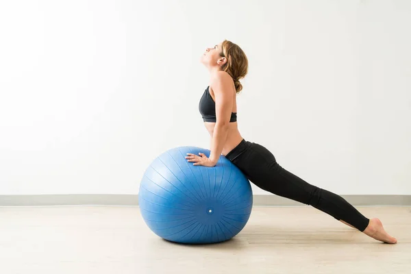 Pretty Brunette Female Exercising While Leaning Fitness Ball Training Studio — Stock Photo, Image