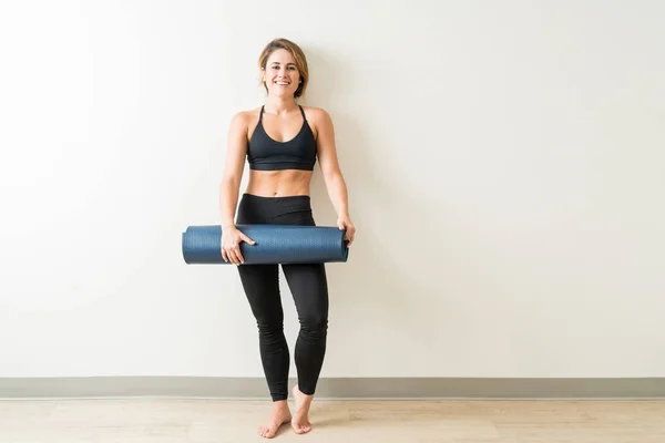 Full Length Portrait Beautiful Young Woman Holding Exercise Mat White — Stock Photo, Image
