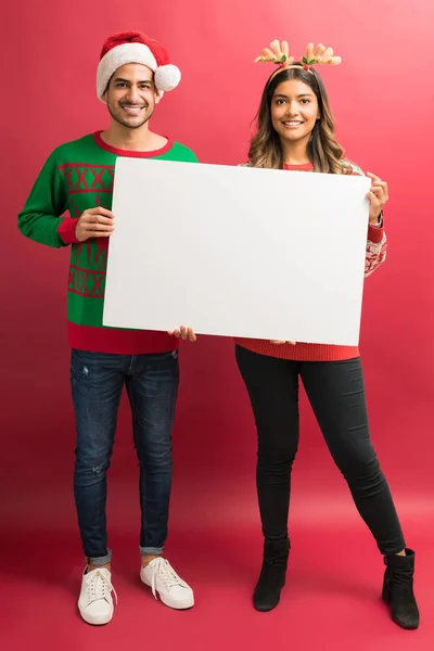 Full Length Smiling Young Couple Holding Blank White Placard Isolated — Stock Photo, Image