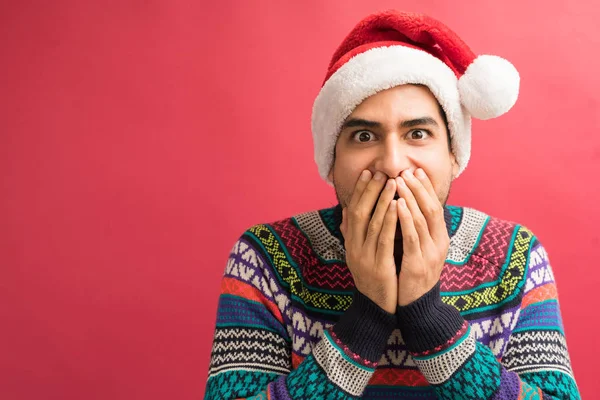 Hispanic Man Shocked Unexpected News While Covering Mouth Hands Studio — Stock Photo, Image