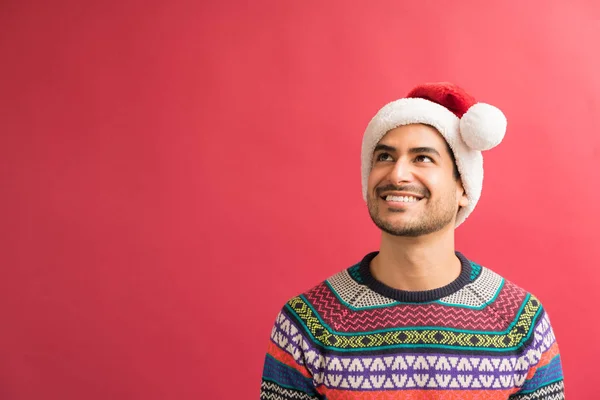 Thoughtful Attractive Latin Male Looking While Smiling Plain Background — Stock Photo, Image