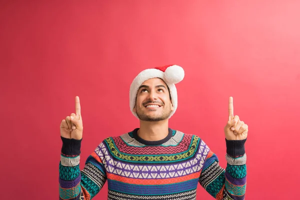 Handsome Young Hispanic Man Looking Showing Red Copy Space Isolated — Stock Photo, Image