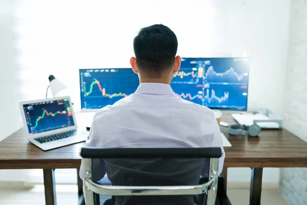 Rear View Young Latin Male Finance Broker Analyzing Stock Graphs — Stock Photo, Image