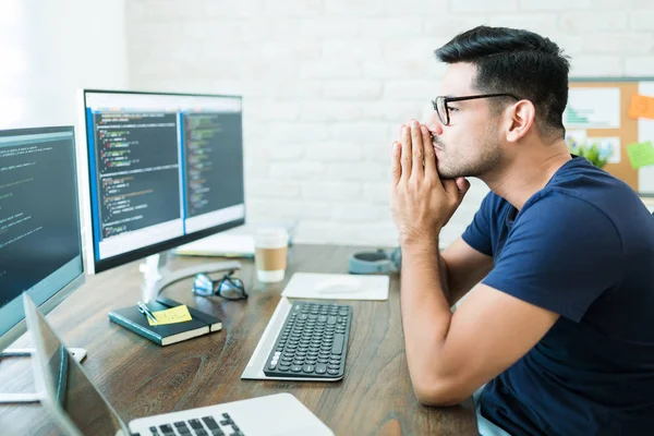 Handsome Hispanic Programming Professional Praying Luck While Sitting Hands Clasped — Stock Photo, Image