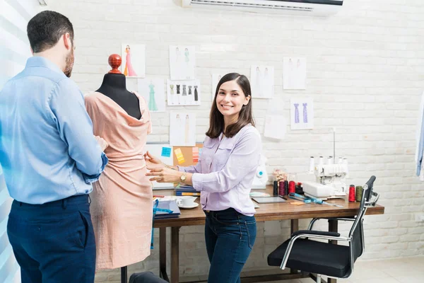 Portrait Smiling Beautiful Young Dressmaker Dressing Mannequin Factory — Stock Photo, Image