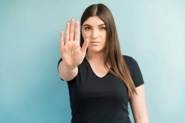 Beautiful Young Woman Showing Stop Gesture Hand While Making Eye — Stock Photo, Image