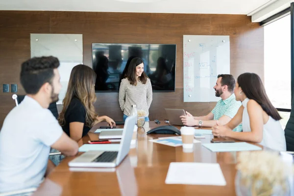 Smiling Female Executive Giving Presentation Team Meeting Room Office — Stock Photo, Image