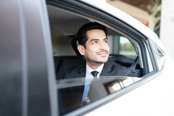 Confident Young Businessman Looking Window While Traveling Taxi — Stock Photo, Image