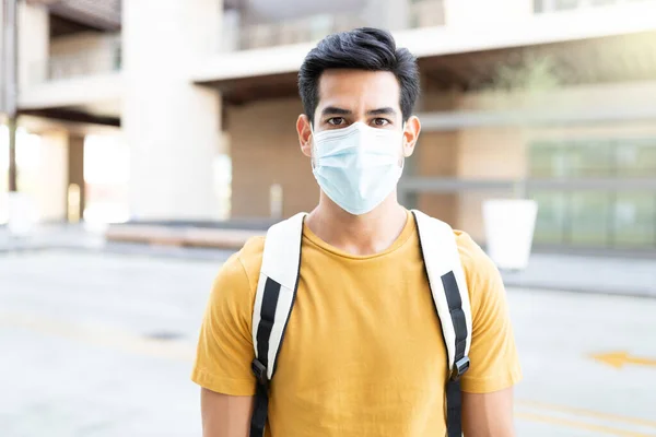 Portrait of young man wearing mask during coronavirus outbreak