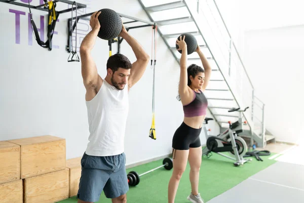 Active Hispanic Young Couple Working Out Cross Training Gym Wall — Stock Photo, Image