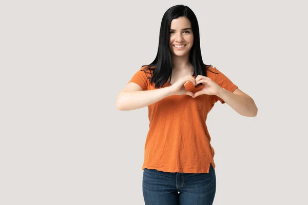 Attractive Smiling Caucasian Young Woman Making Heart Shape Hands — Stock Photo, Image