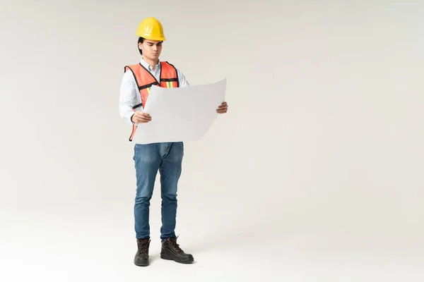 Full Length Young Male Civil Engineer Examining Building Plan Studio — Stock Photo, Image