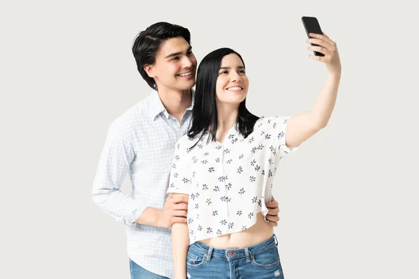 Smiling Young Woman Taking Selfie Man Smartphone White Background — Stock Photo, Image