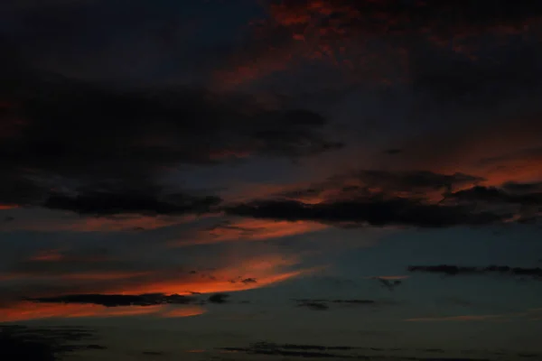 Amazing cloudscape on the sky at sunset time after rain — Stock Photo, Image