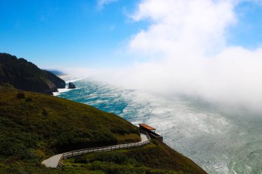 Beautiful view of highway 1 along the Pacific coast. clipart