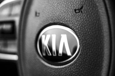 Minsk, Belarus - February 1, 2019. Concept car KIA Sportage - logo. clipart