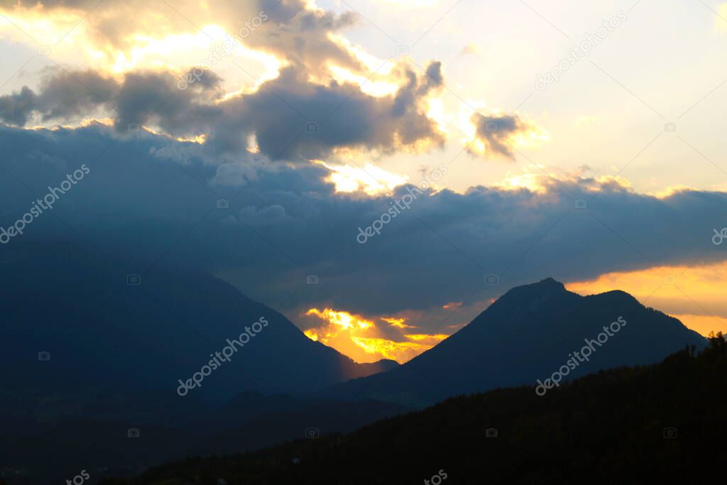 View of a beautiful bright sunset high in the mountains