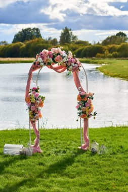 Wedding arch by the water.