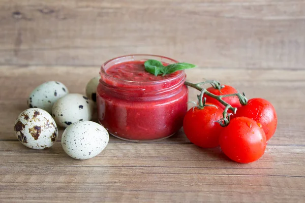 Tomato paste, red tomato ketchup. Tomato sauce in a jar. Recipe for tomato paste.