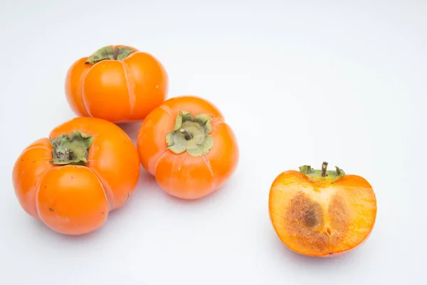 Cáqui fresco e maduro, cáqui. Vitaminas no inverno — Fotografia de Stock