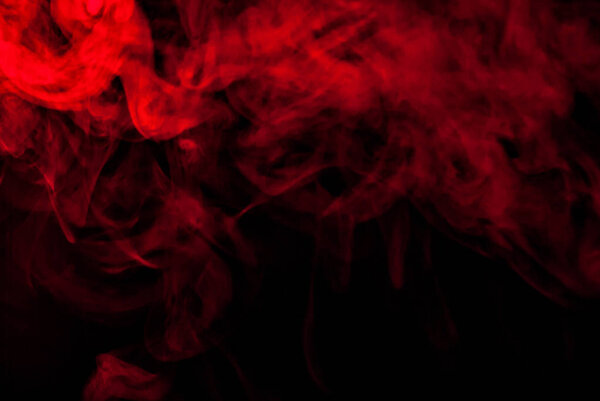 Red smoke on a black background. Texture