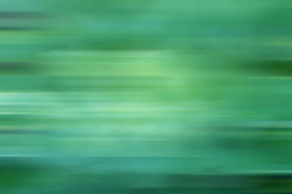 abstract blur of green color for motion background, green bokeh nature