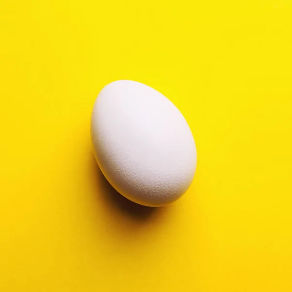 White Raw Egg Yellow Background Close — Stock Photo, Image