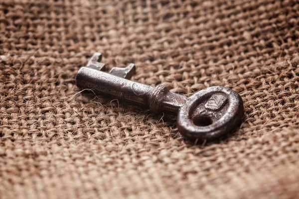 Old Key Rustic Sackcloth Background Close — Stock Photo, Image