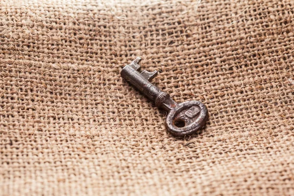 Old Key Rustic Sackcloth Background Close — Stock Photo, Image