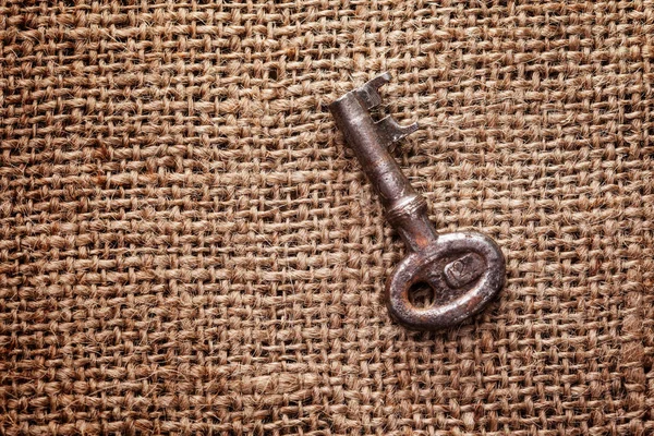 Old Key Rustic Sackcloth Background Close — Stock Photo, Image