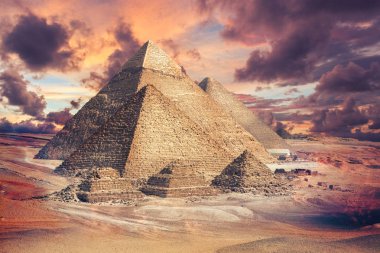 Scenic view of pyramids in Giza with delightful sky on background  clipart