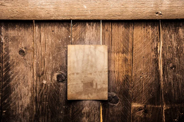 Vintage Blanko Foto Auf Einem Hölzernen Hintergrund — Stockfoto