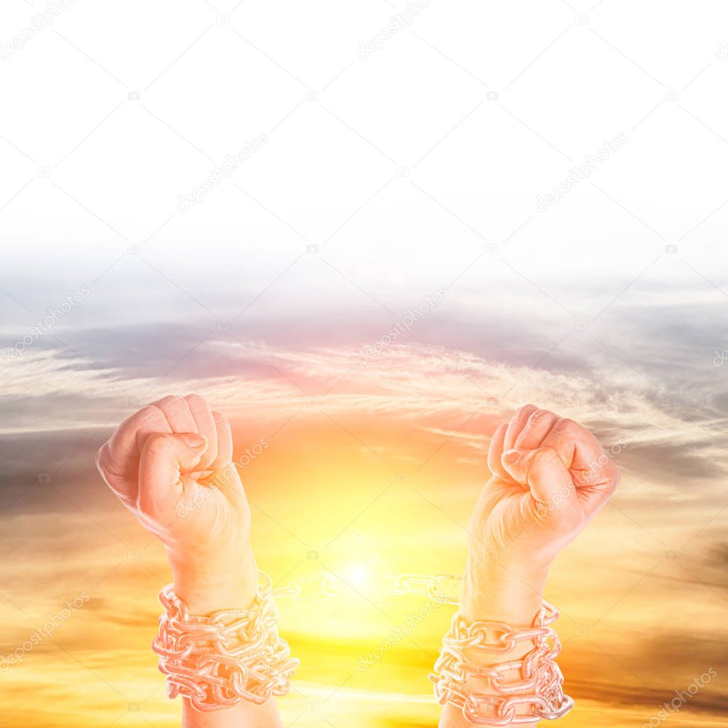 Two hands in chains on a white background