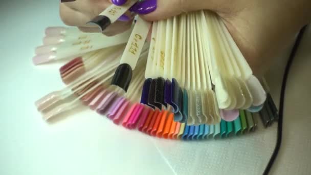 Woman Choosing Color Nail Polish Manicure — Stock Video