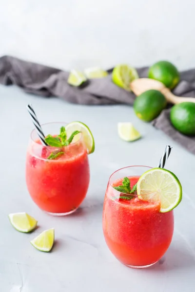 Food and drink, party holiday concept. Alcohol beverage cold cool red watermelon cocktail drink on a modern table for summer days