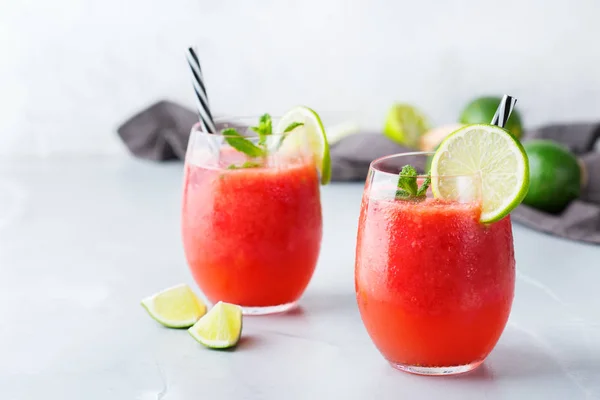 Food and drink, party holiday concept. Alcohol beverage cold cool red watermelon cocktail drink on a modern table for summer days