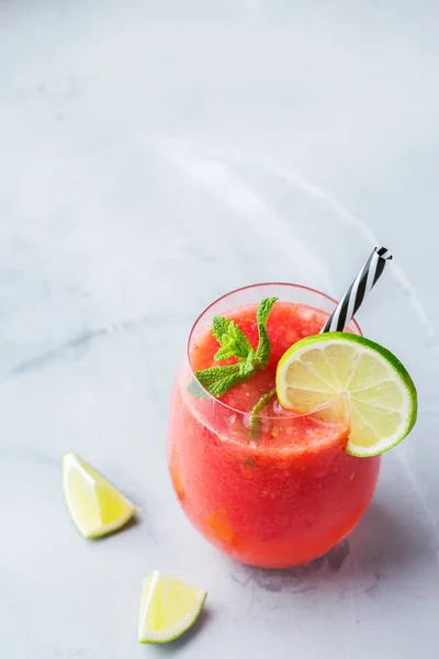 Food and drink, party holiday concept. Alcohol beverage cold cool red watermelon cocktail drink on a modern table for summer days. Copy space background