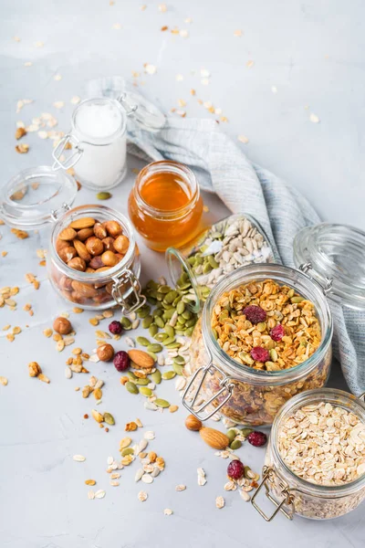 Homemade granola muesli with ingredients, healthy food for breakfast