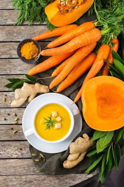 Seasonal spicy fall autumn creamy pumpkin and carrot soup