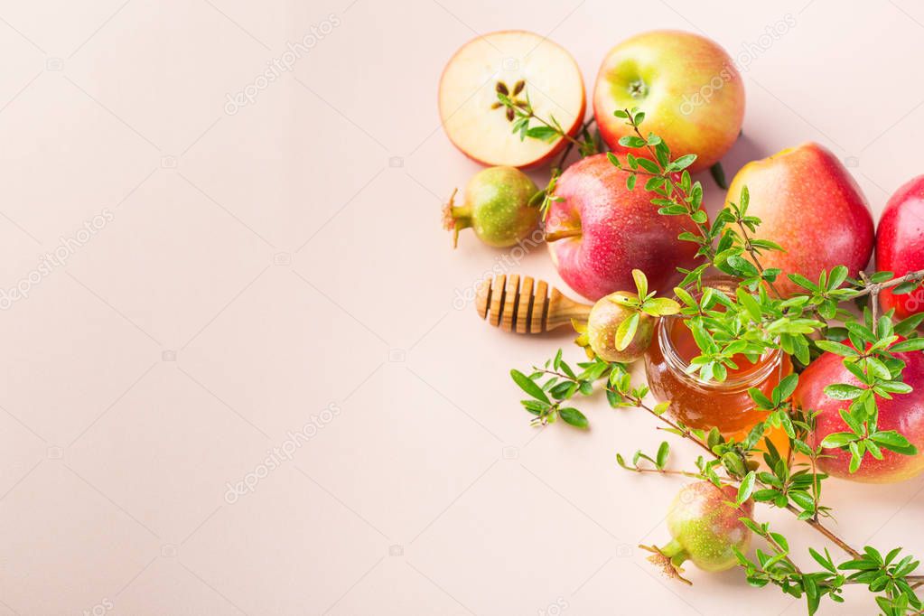 Rosh Hashana, jewish new year holiday concept, honey, apple, pomegranate