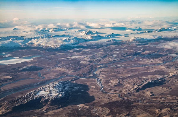 Aerial view of Iceland. Aerial view of amazing iceland landscapes, glacier patterns, mountains, rivers and shapes. Beautiful natural backdrop. Iceland from sky.