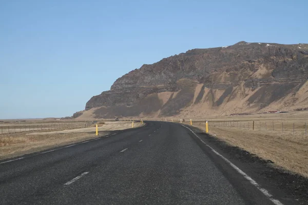 Road in Iceland. Landscape and road in winter, road trip on the country at Iceland. Beautifull nature of Iceland. Epic and majestic landsacapes. Route Number One (Ring Road)